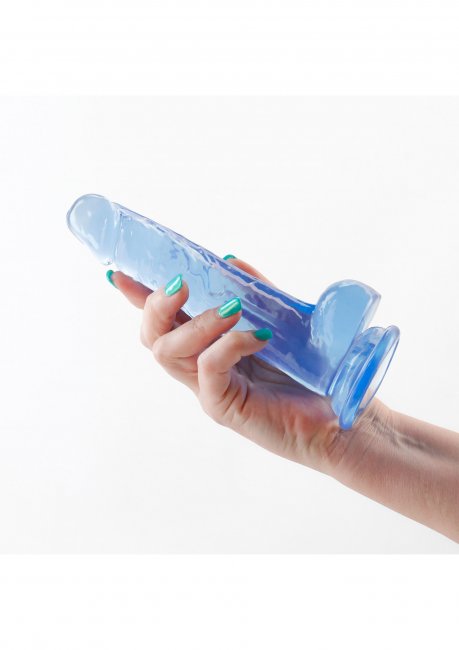 Fantasia Dildo Ballsy 6.5 - blå semi transparant dildo i hand för storleks referens.