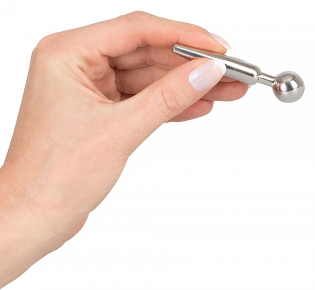 Ihålig dilator tillverkad av högkvalitativ rostfritt stål. Gradvist ökande konform. Med stoppkula. Stimulerande. Enkel.