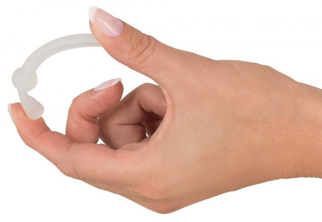 Ihålig dilator tillverkad av högkvalitativ silikon. Med stoppkula i toppen. Flexibel design. Avtagbar propp. För kvinnor/män.