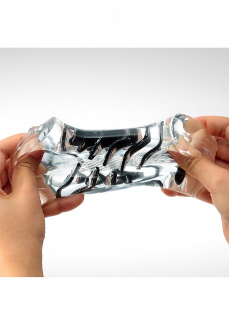 Genomskinlig masturbator med en unik 3D design som stimulerar. Högkvalitativt och superstretchigt material. Återanvändbar.